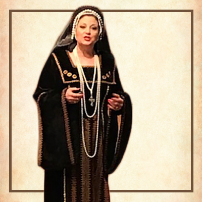 Image of a woman wearing a cloak